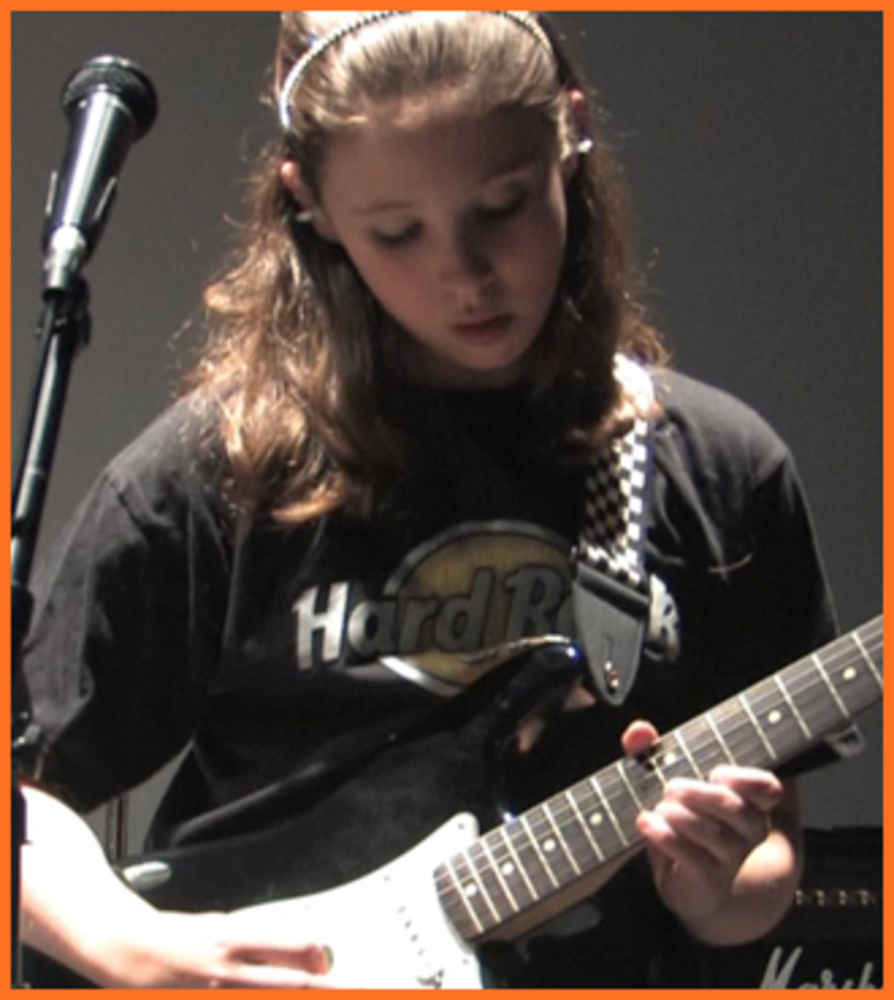 ></p>
<p><b>Zoey B</b> is Bach to Rock's Student of the Month for May 2014. She attends B2R Herndon in Virginia. Zoey plays guitar and sings in the B2R band More or Less. Tom Hatcher is her instructor for B2R Rock Band. More or Less recently placed first in the semi-annual Battle of the Bands.</p>
<p><iframe loading=