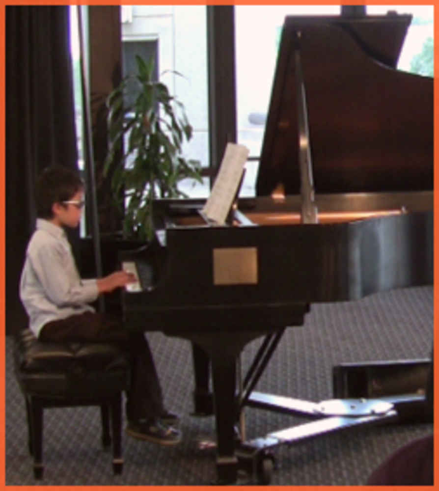 ></p><p>Kenny L is the B2R May Student of the Month! Kenneth is in 3rd grade and enjoys swimming, soccer, Taekwondo and chess. In this performance at the B2R Music Showcase at George Mason University Concert Hall, he is playing Menuet Medley Sonata D by Mozart on the piano.</p><p><iframe width=