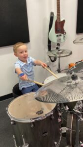 David practicing his rock-n-roll drumming skills! 