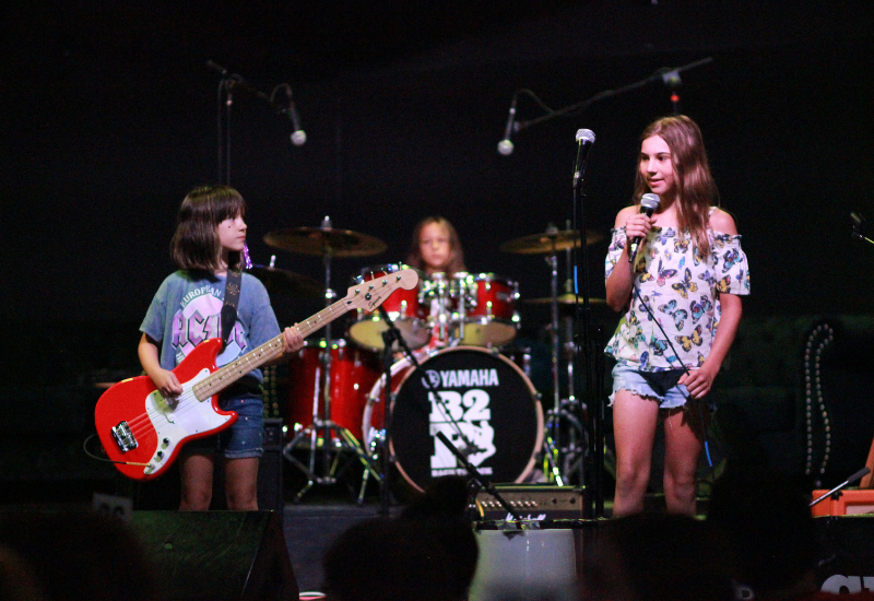 student band performing at the Battle of the Bands event on stage